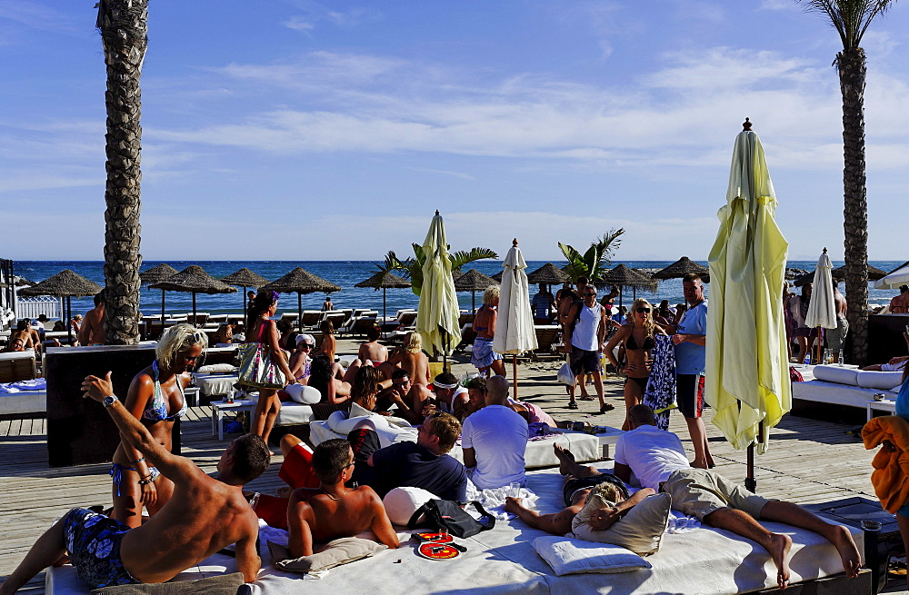 Vacationers in Buddha Beach Club, Puerto Banus, Marbella, Andalusia, Spain