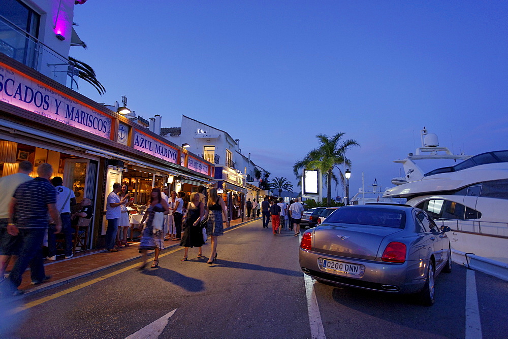 Luxury cars, Restaurants near harbour, Puerto Banus, Marbella, Andalusia, Spain