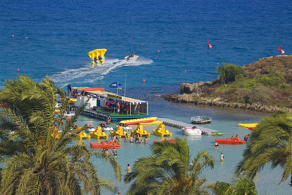 View of Nissi beach with palm trees, Agia Napa, South Cyprus, Cyprus