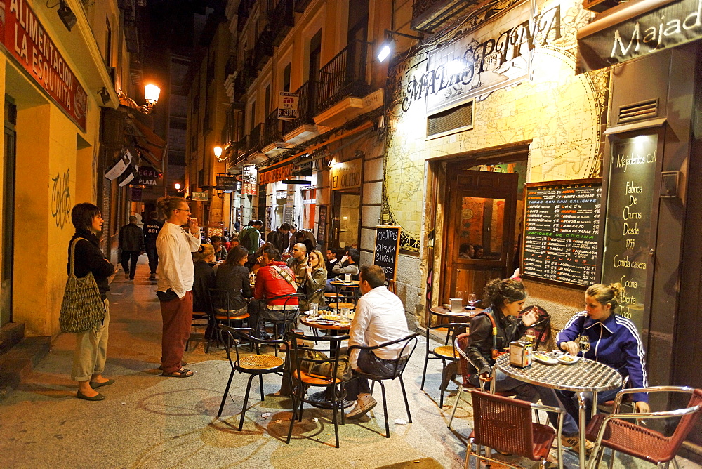 Guests in bars in the evening, Calle de Huertas, Madrid, Spain