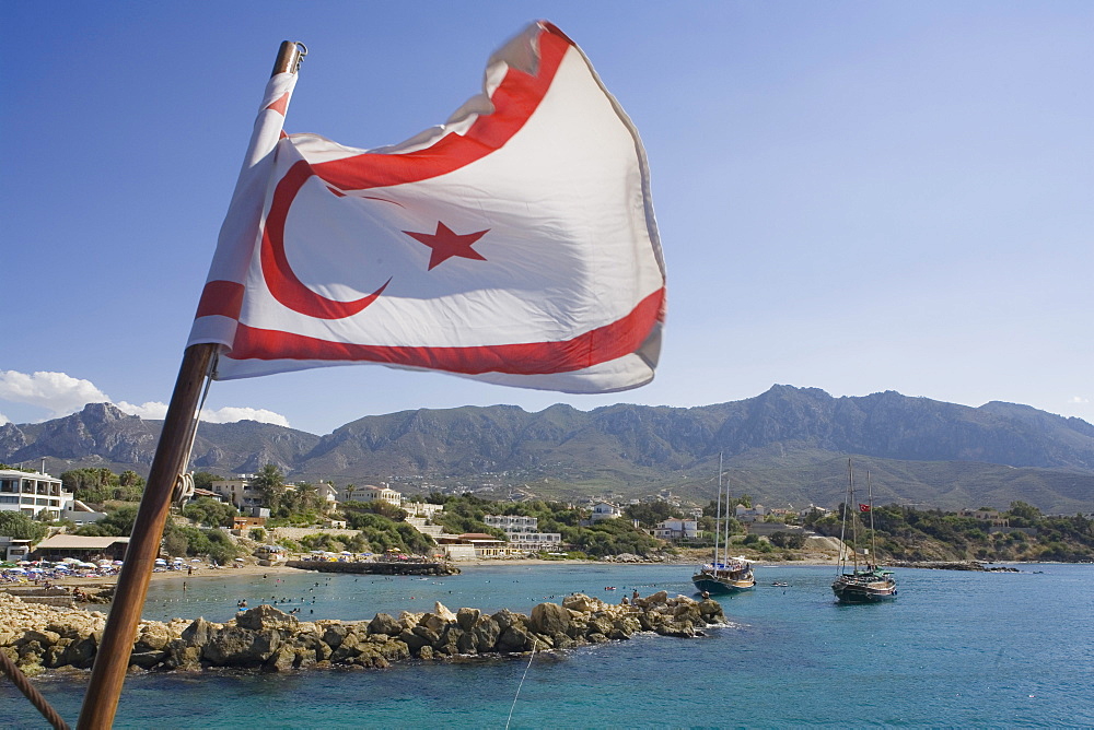 Neptun Pirate boat trip, by Kaleidoskop Turizm, and coast, with flag of the Turkish Republic of Northern Cyprus, Kyrenia, Girne, Cyprus