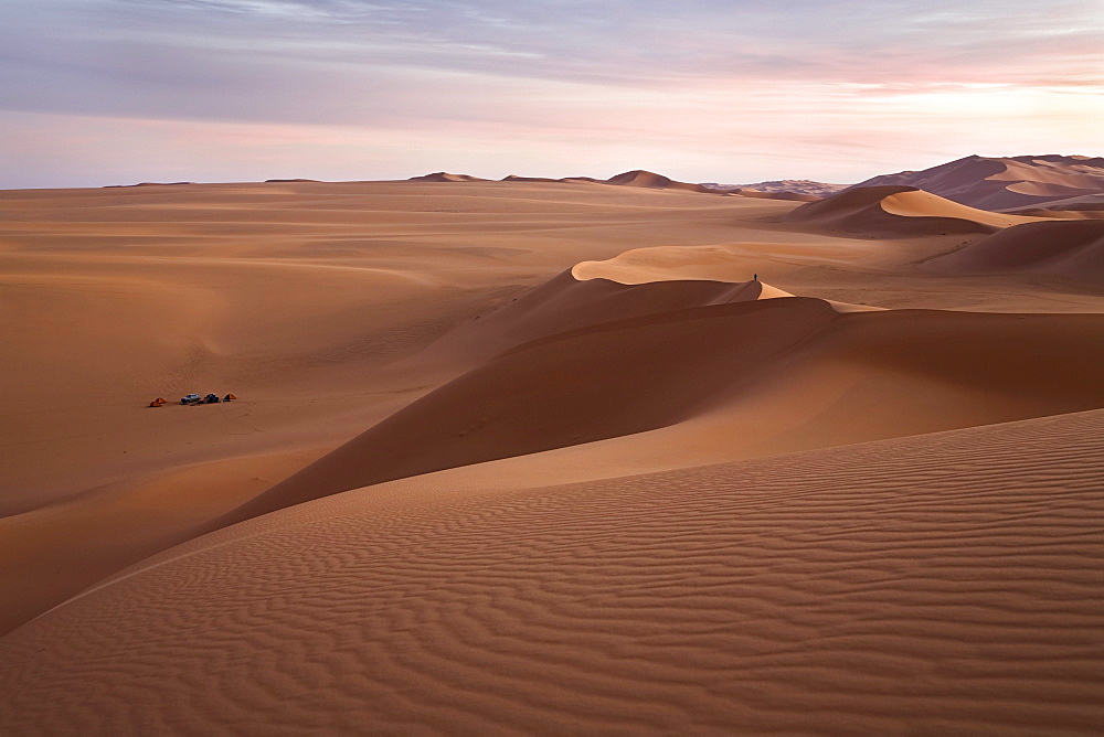 Sanddunes in the libyan desert with moon at dawn, Sahara, Libya, North Africa