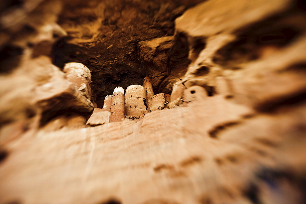 Mud buildings under a rock face at the region of the Dogon people, La Falaise da Bandiagara, Mali, Africa