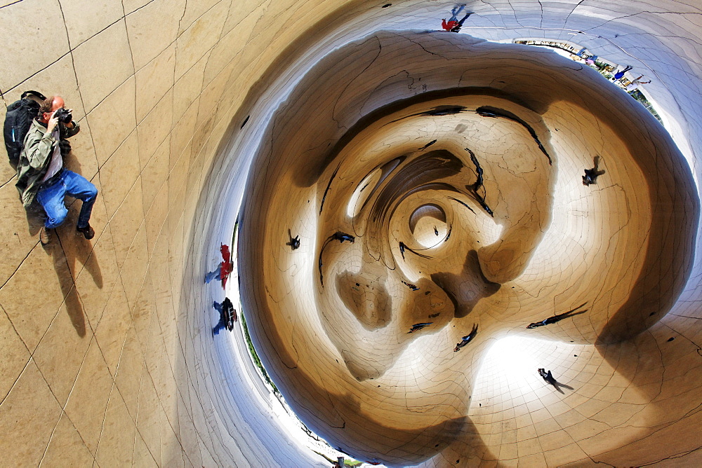 Reflexions in Cloud Gate by British artist Anish Kapoor, Chicago, Illinois, USA