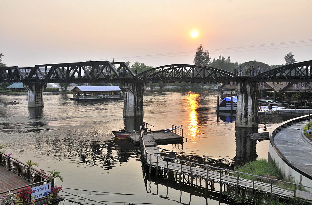 Railwaybridge over Kwai river at sunset, Kanchanaburi, Thailand, Asia