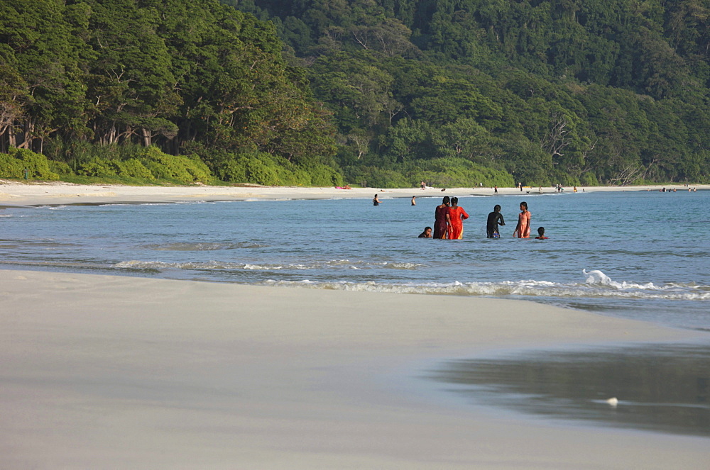 Local girls wearing saris at Radha Nagar Beach, Beach 7, Havelock Island, Andamans, India