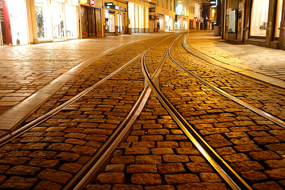 Tram lines in the Old Town of Ghent at night, Flanders, Belgium