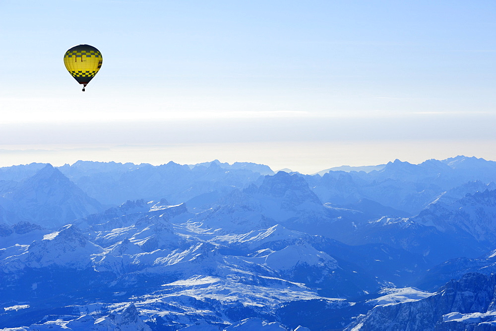 Hot-air balloon flying above Dolomites with Antelao, Averau, Nuvolau and Pelmo, aerial photo, Dolomites, South Tyrol, Italy, Europe