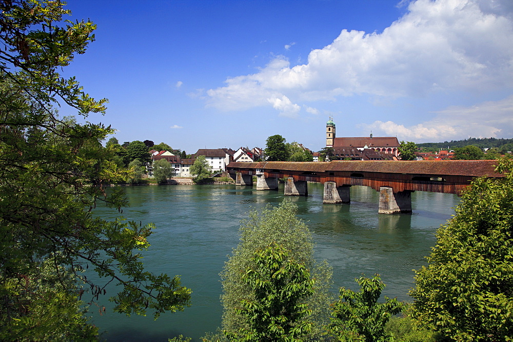 View over the covered bridge from the Swiss border across the Rhine river, Bad Saeckingen, High Rhine, Black Forest, Baden-Wuerttemberg, Germany, Europe