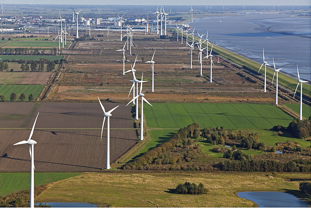 Aerial photo of a wind farm along the North Sea coast, farmland and Ems estuary, Emden, Lower Saxony, northern Germany