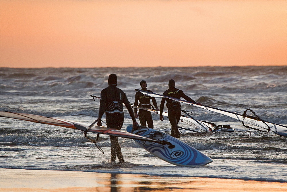 Windsurfer on the beach at St Peter-Ording, Evening light, Schleswig-Holstein, North Sea coast, Germany