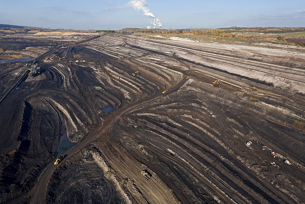 Aerial view of a bucket-wheel excavator with conveyor belt in for open-pit lignite mining, brown coal, Schoeningen, Lower Saxony, Germany