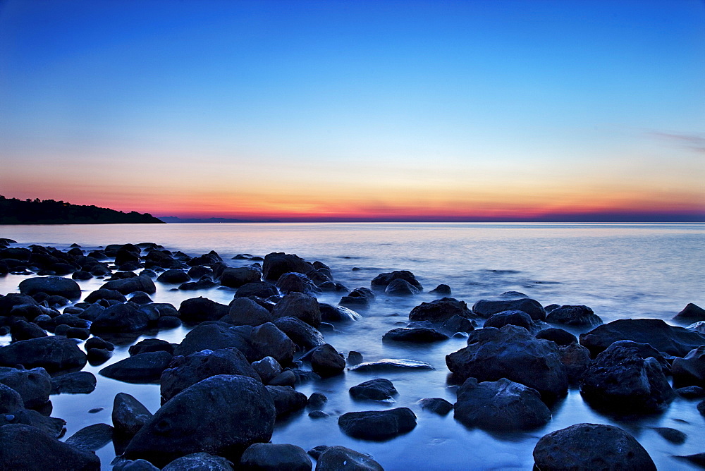 Rocks in sea at night, CefalË™, Palermo, Sicily, Italy
