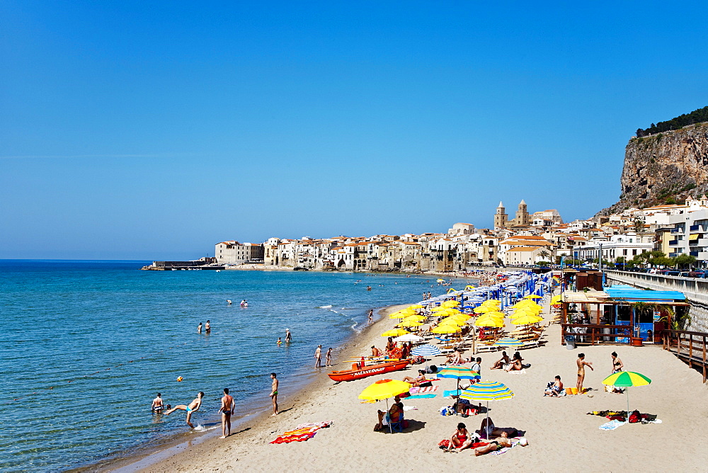 Beach, old town, cathedral and cliff La Rocca, CefalË™, Palermo, Sicily, Italy