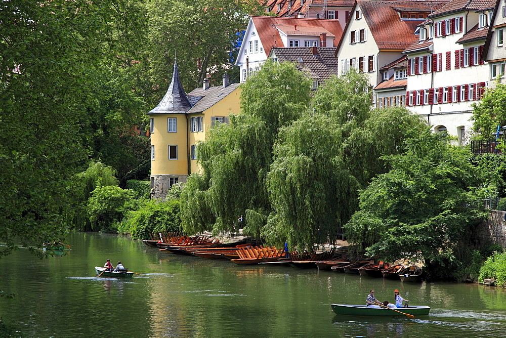 Rowboats at Neckar river, water front with Hoelderlin tower, Tuebingen Neckar, Baden-Wuerttemberg, Germany