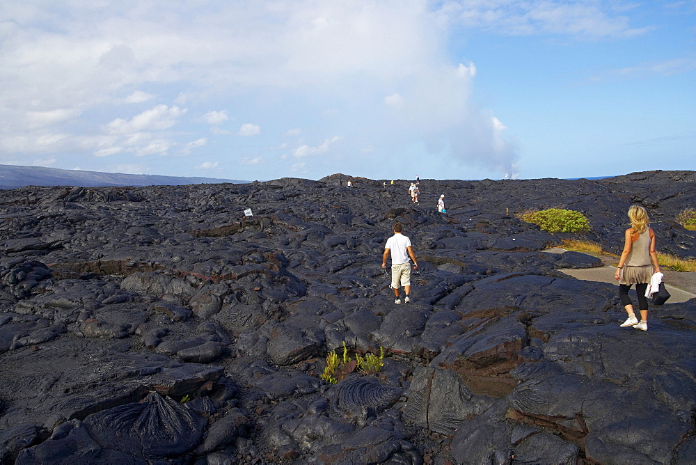 People walking over volcanic rocks, Hawaii Volcanoes National Park, Chain of Craters Road, Big Island, Hawaii, USA, America