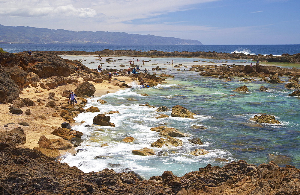 People at snorkeling area at the coast, North Shore, Oahu, Hawaii, USA, America