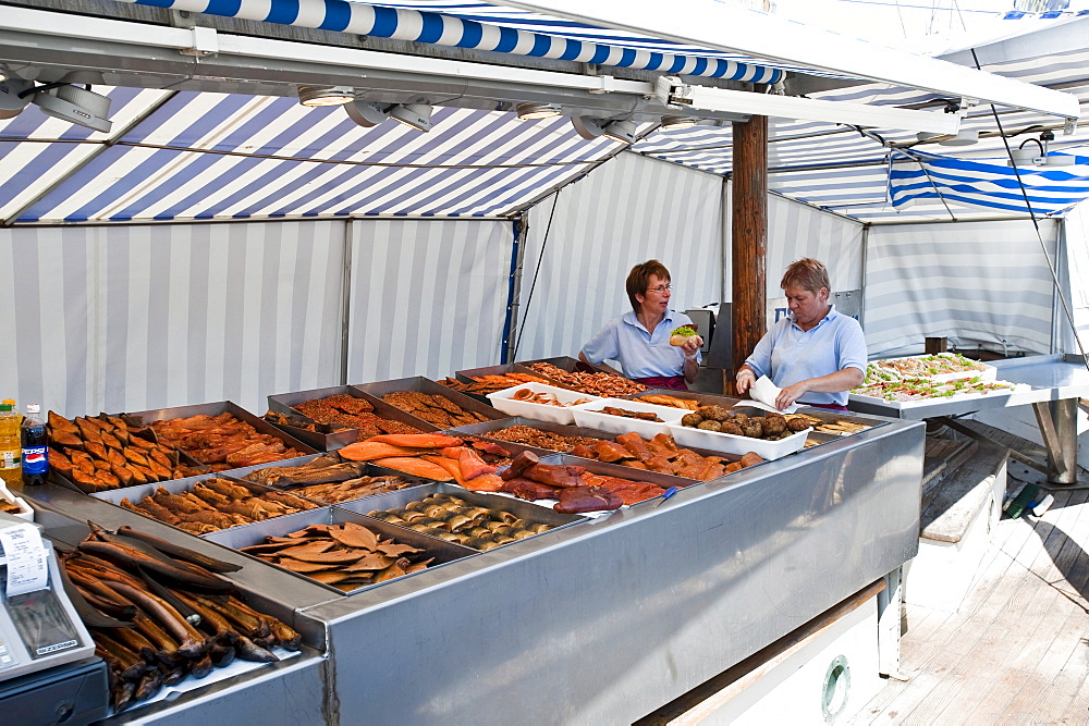 Fishmonger at harbor, Wismar, Mecklenburg-Vorpommern, Germany