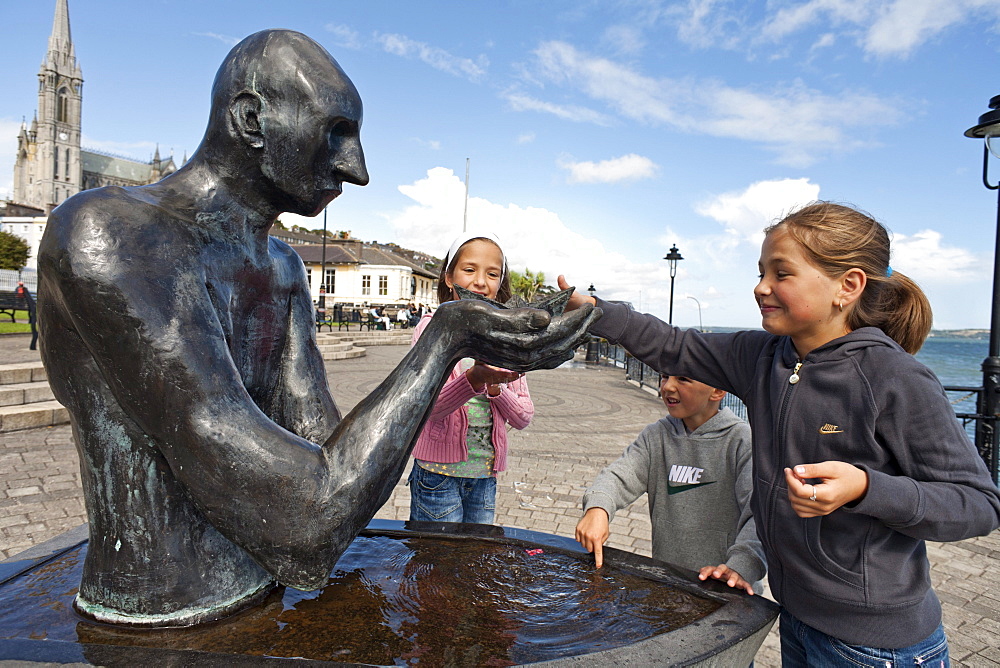 Children playing by a fountain, Cobh, County Cork, Ireland