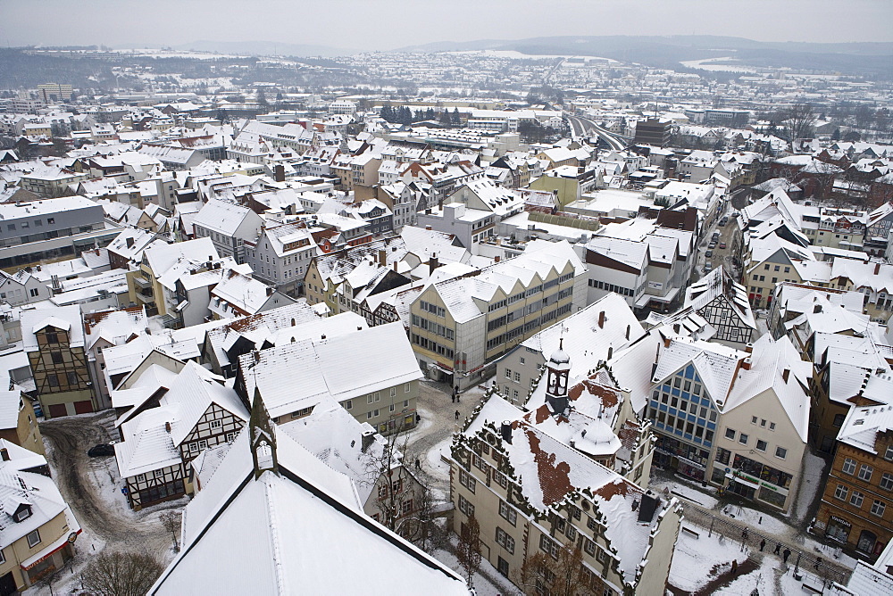 View from the parish church towards the snow covered rooftops, Bad Hersfeld, Hesse, Germany, Europe