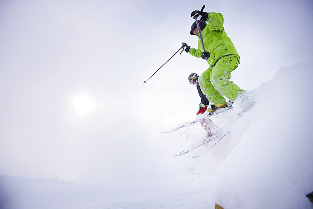 Male free skiers in deep snow, Mayrhofen, Ziller river valley, Tyrol, Austria