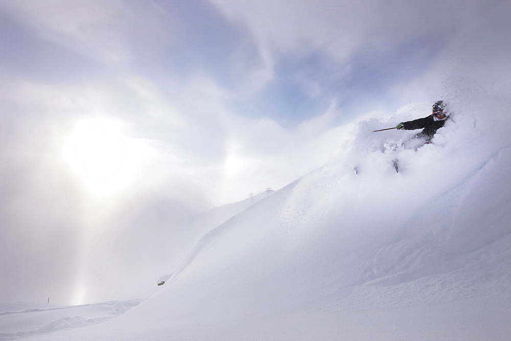 Male free skier in deep snow, Mayrhofen, Ziller river valley, Tyrol, Austria