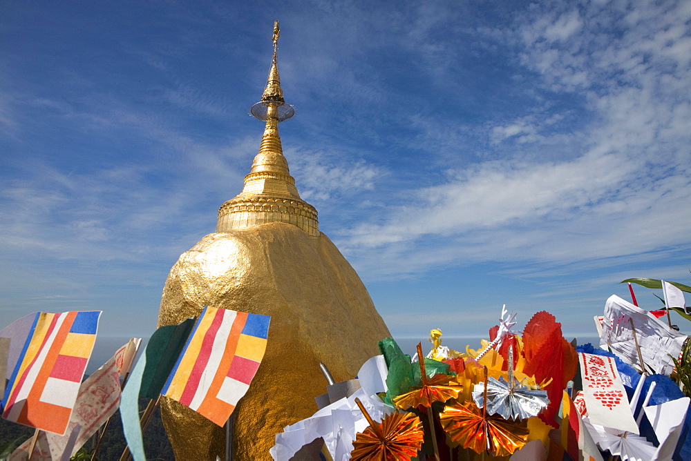 The Golden Rock with flags, Buddhistic pilgrim destination Kyaikhtiyo Pagoda, Mon State, Myanmar, Birma, Asia