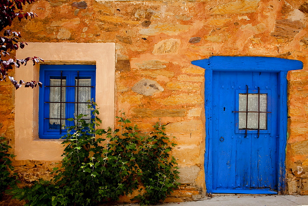 House with painted blue door, Murias de Rechivaldo, near Astorga, Camino Frances, Way of St. James, Camino de Santiago, pilgrims way, UNESCO World Heritage, European Cultural Route, province of Leon, Old Castile, Castile-Leon, Castilla y Leon, Northern Spain, Spain, Europe