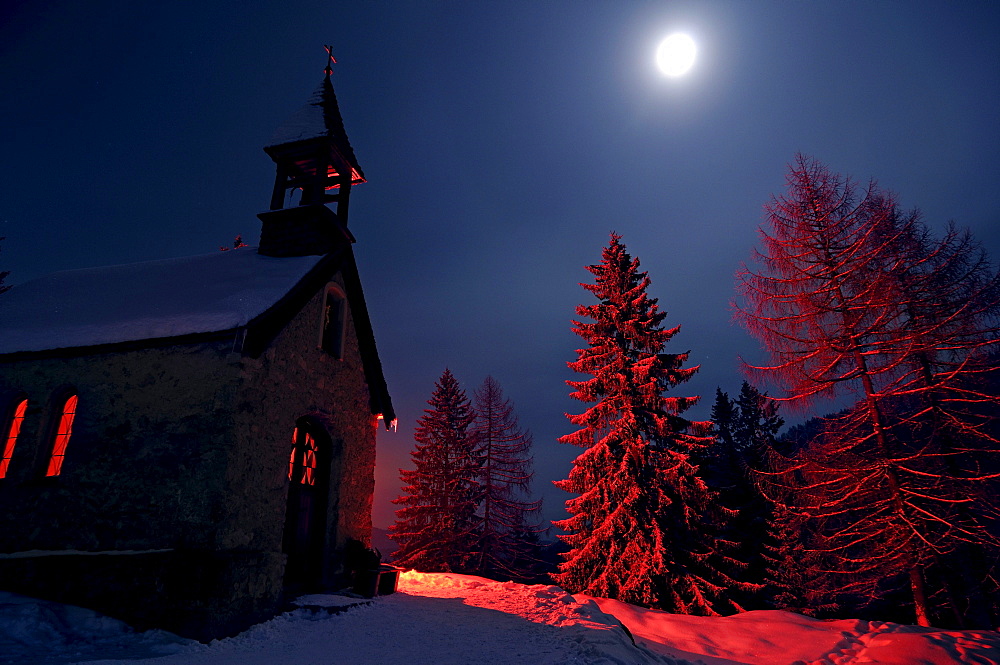 St. Anna chapel in the snow at full moon, Hemmersuppenalm, Reit im Winkl, Chiemgau, Upper Bavaria, Bavaria, Germany, Europe