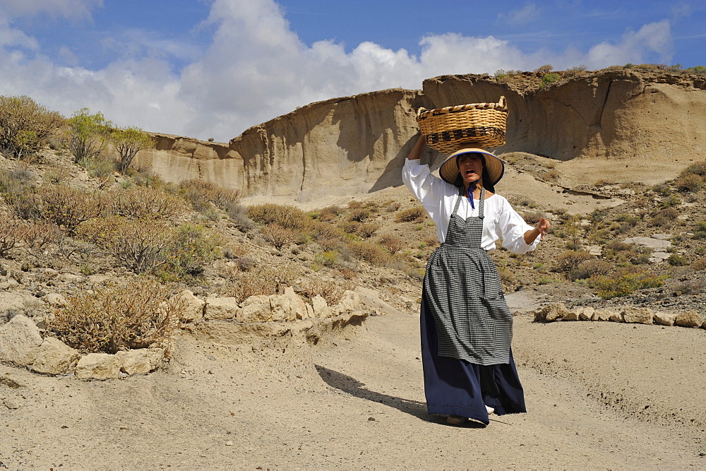 Enactment of a typical peasant woman on the way to market, Reserva San Blas, South Tenerife, Canary Islands, Spain