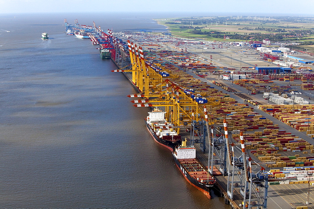 Aerial view of a container port with loading cranes, terminal and freight ships, Bremerhaven, Bremen, Germany