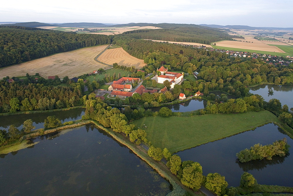 Aerial view of Derneburg Castle, former monastery, once home to artist Georg Baselitz, Holle, Hildesheim, Lower Saxony, Germany