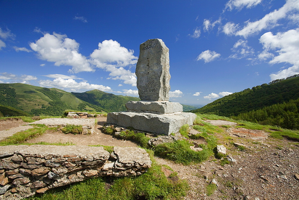 Monument of Roland under clouded sky, Puerto de Ibaneta, Pyrenees, Province of Navarra, Northern Spain, Spain, Europe