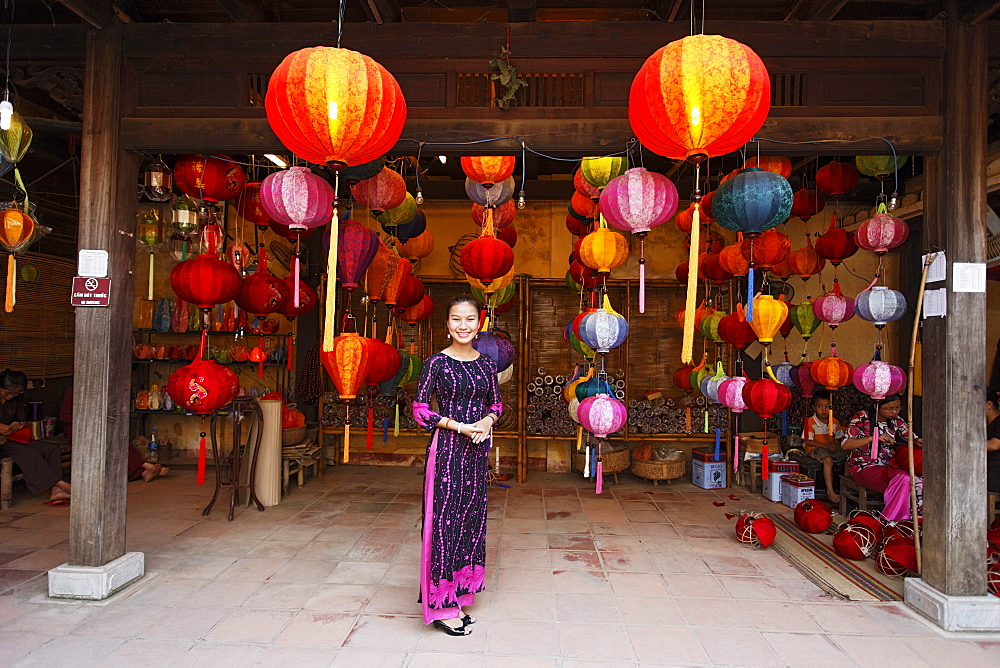 Woman inside a lampion store, Hoi An, Annma, Vietnam