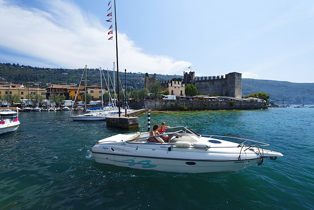 Couple in Boat, Harbor, Scaliger Castle, Torri del Benaco, Lake Garda, Veneto, Italy