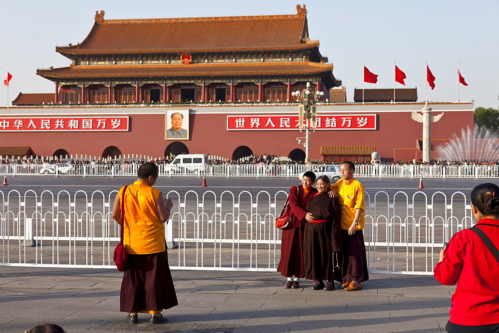 Tibetan monks and nuns on Tiananmen Square, taking pictures, Gate of Heavenly Peace, Mao Zedong, Beijing, People's Republic of China