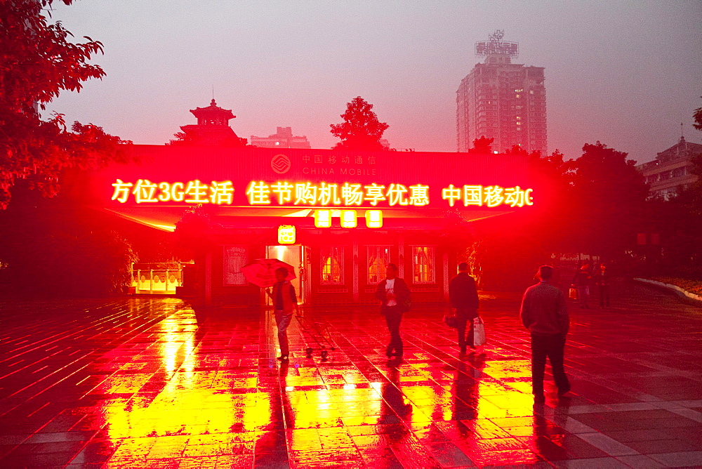 Shapingba District in the evening, skyscrapers and advertisement, Chongqing, People's Republic of China