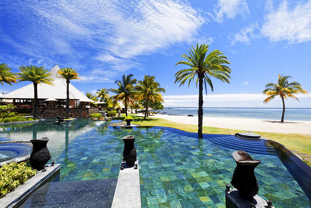 Pool and restaurant of the Shanti Maurice Resort in the sunlight, Souillac, Mauritius, Africa