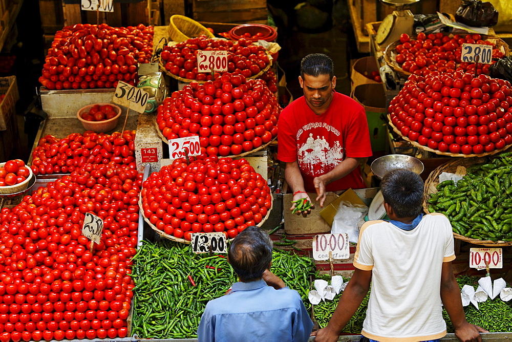 People at stalls in the market hall, Port Louis, Mauritius, Africa