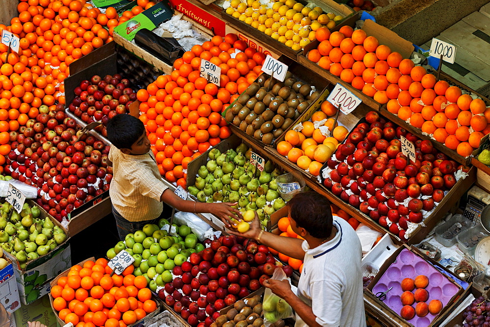 People at stalls in the market hall, Port Louis, Mauritius, Africa