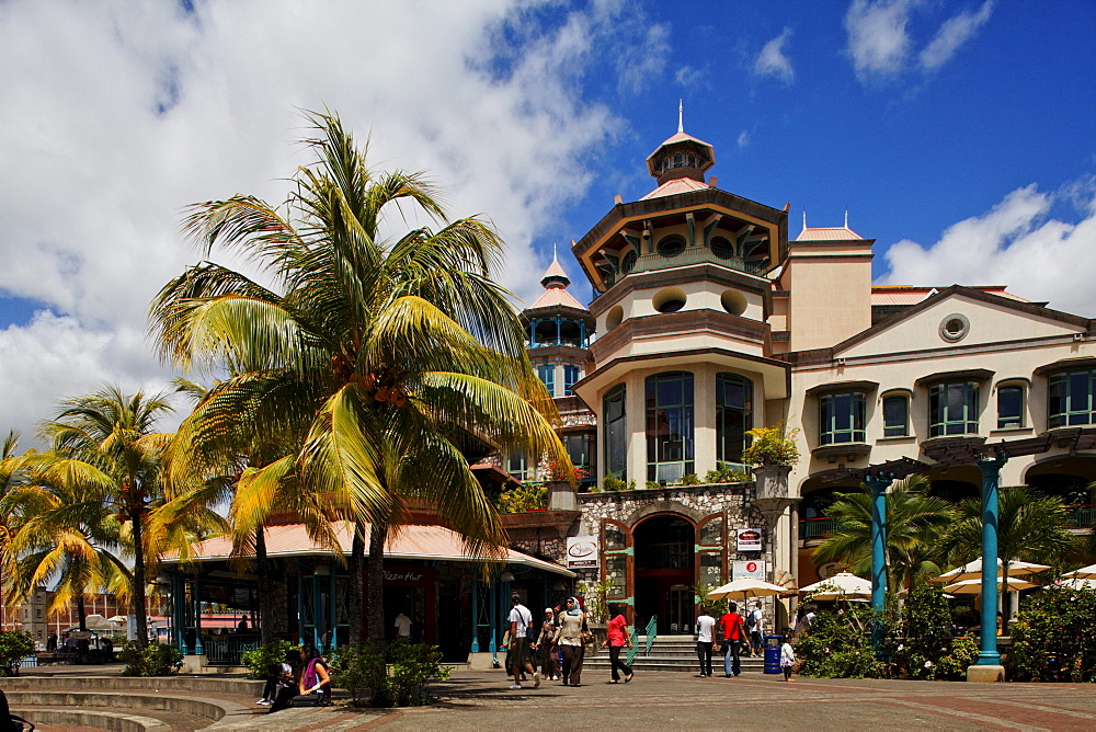 People in front of the Le Caudan Waterfront shopping center, Port Louis, Mauritius, Africa