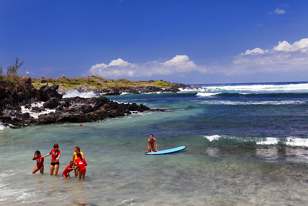 People bathing in the sea, Saint Gilles les Bains, La Reunion, Indian Ocean