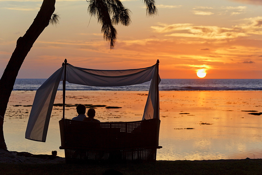 Beach of Grand Hotel du Lagoon at sunset, Saint Gilles, La Reunion, Indian Ocean