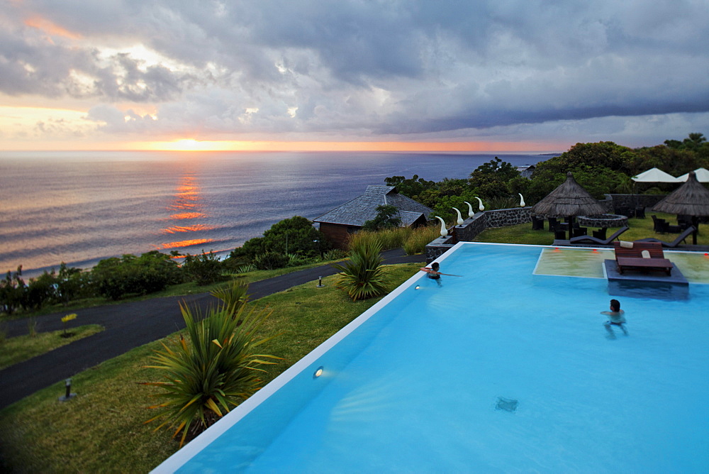 Pool of the Hotel and Spa Palm at sunset, Petite Ile, La Reunion, Indian Ocean