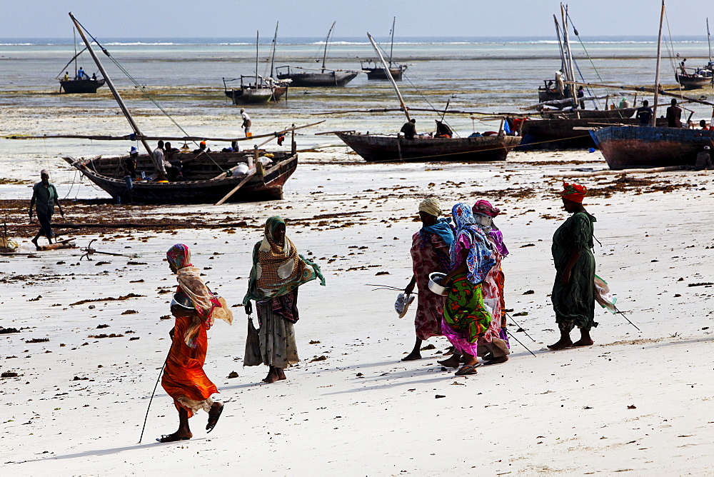 Local people on the beach at Nungwi village, Nungwi, Zanzibar, Tanzania, Africa