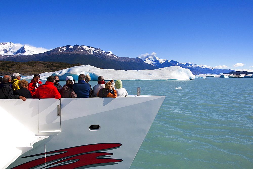 People taking pictures of the glaciers at Lago Argentino, Los Glaciares National Park, near El Calafate, Patagonia, Argentina