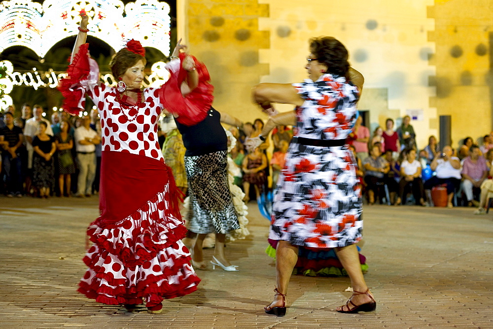 Feria, blurred people dancing, Conil de la Frontera, Andalusia, Spain, Europe