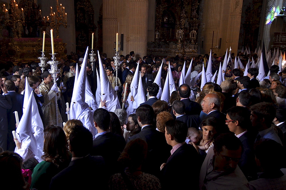 Nazarenos of the brotherhood La Borriquita at the church El Salvador on Palm Sunday, Semana Santa, Sevilla, Andalusia, Spain, Europe