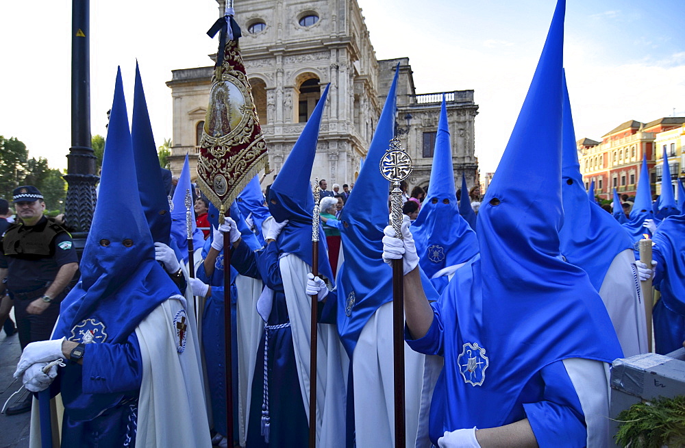 Nazarenos of a brotherhood during procession on Palm Sunday, Semana Santa, Sevilla, Andalusia, Spain, Europe