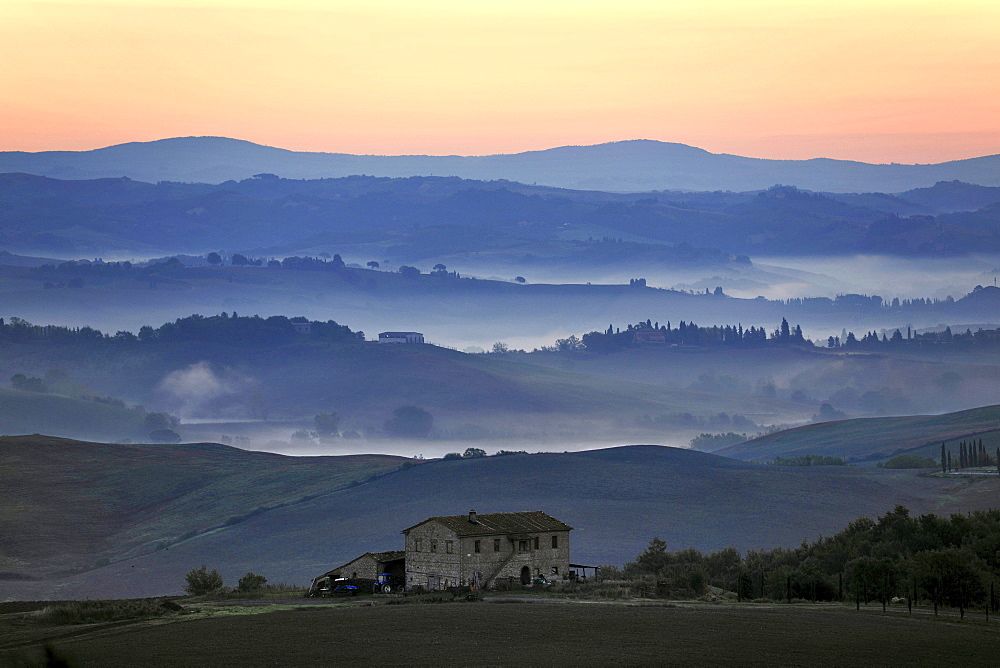 Homestead and hilly landscape at sunrise, Crete, Tuscany, Italy, Europe